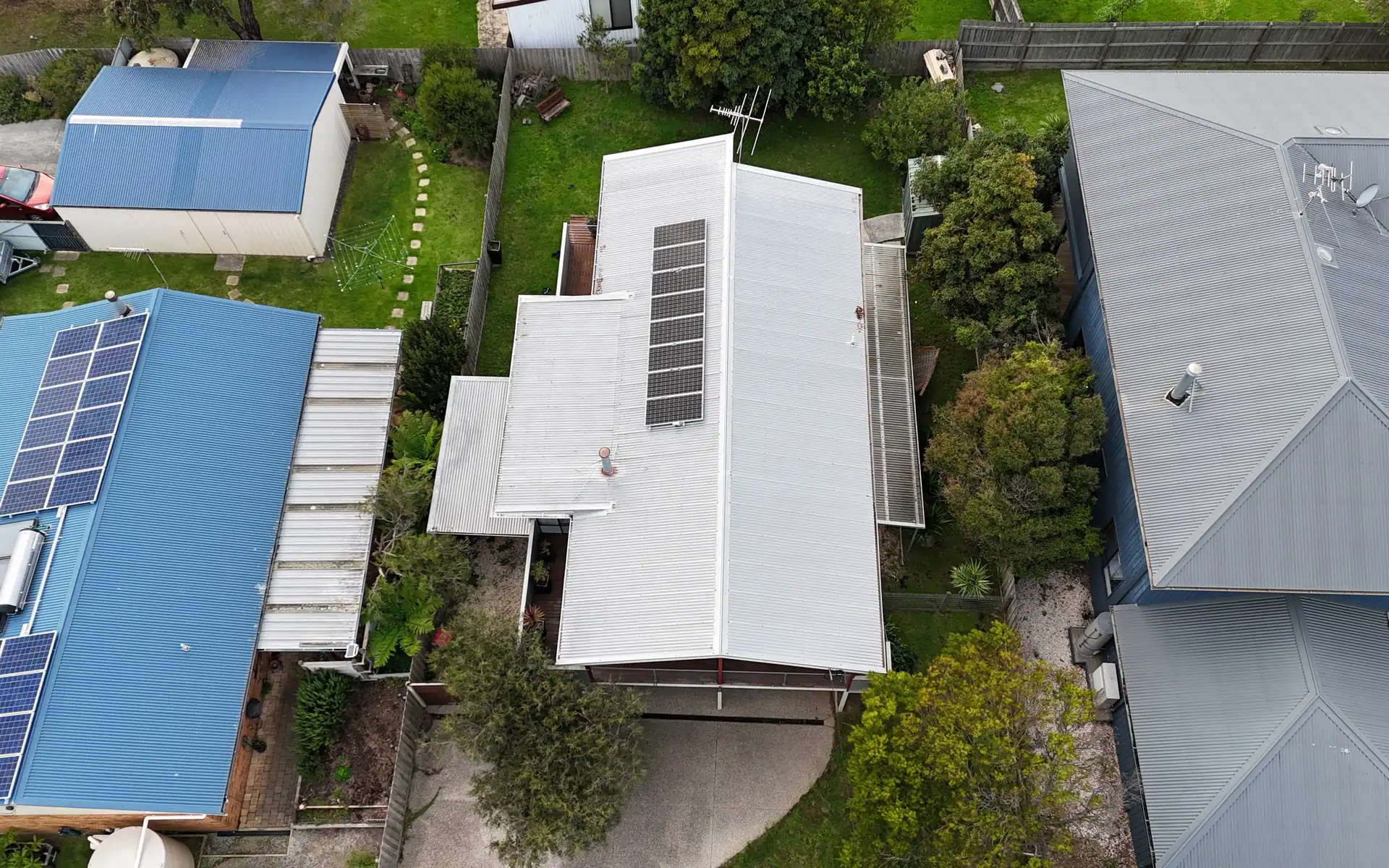 Roof before replacement with existing solar panels