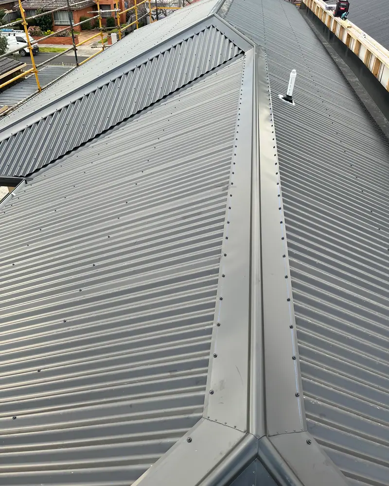 Metal cladding corner and flashing detail