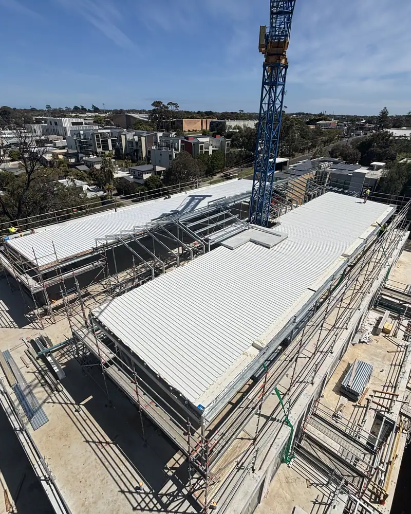 Steel roof framing on a commercial building under construction